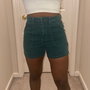 green denim shorts
